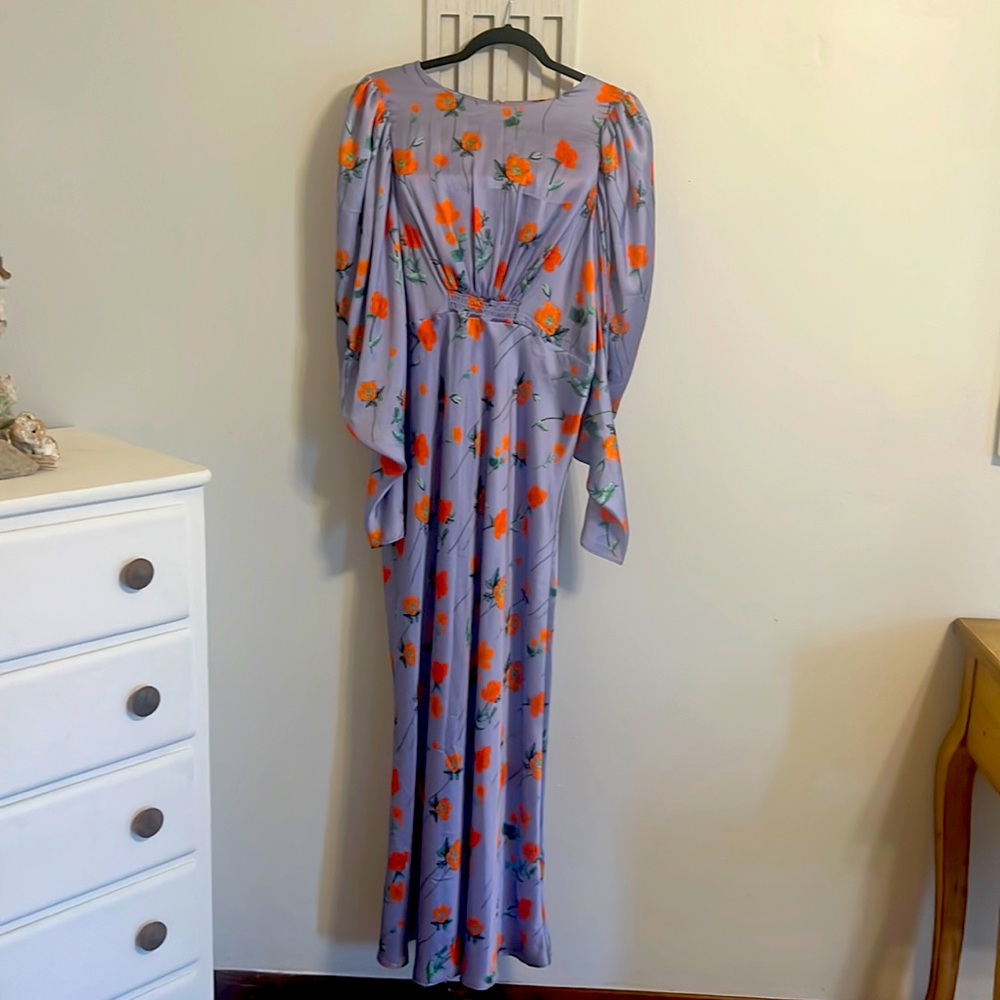 ASOS silky maxi dress lavender with orange flowers and green stems.